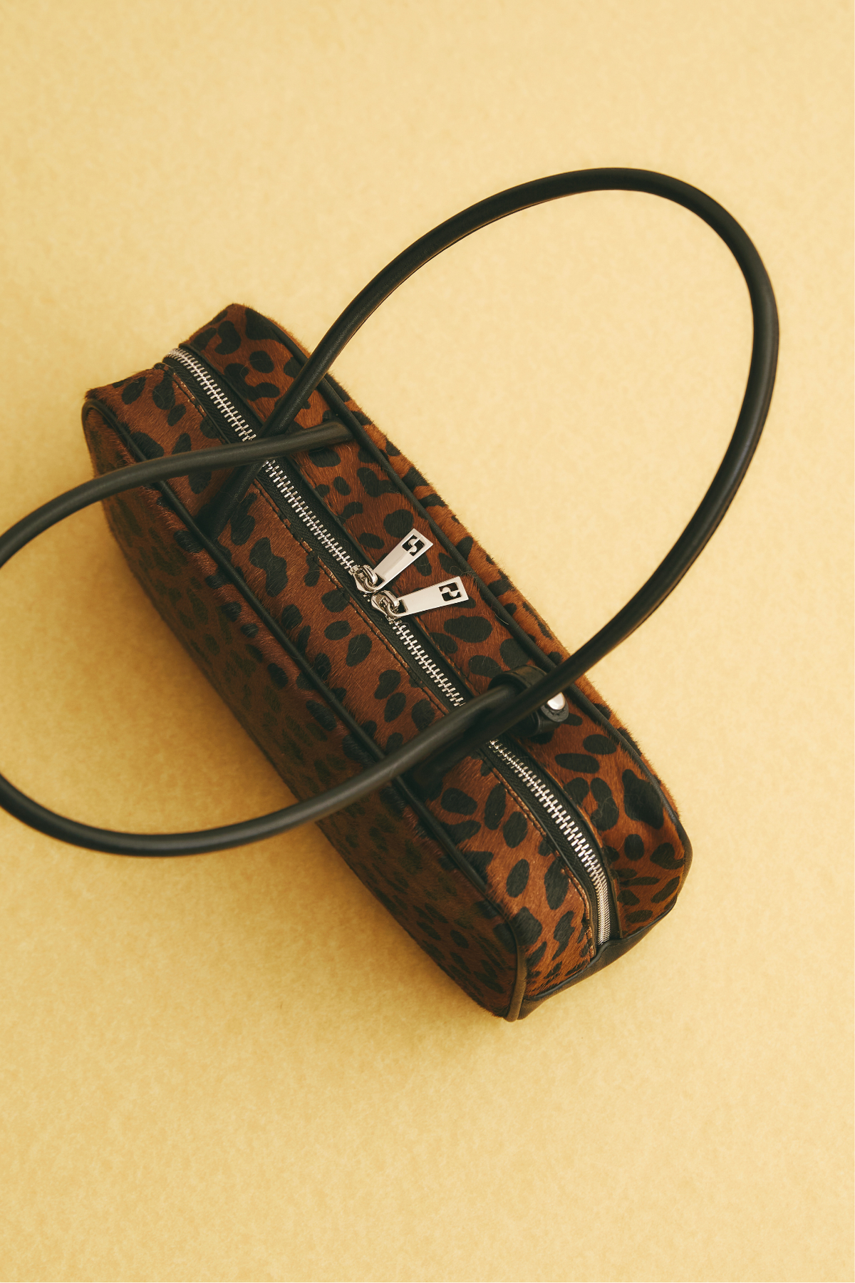 BAGUETTE LEOPARD LEATHER BAG