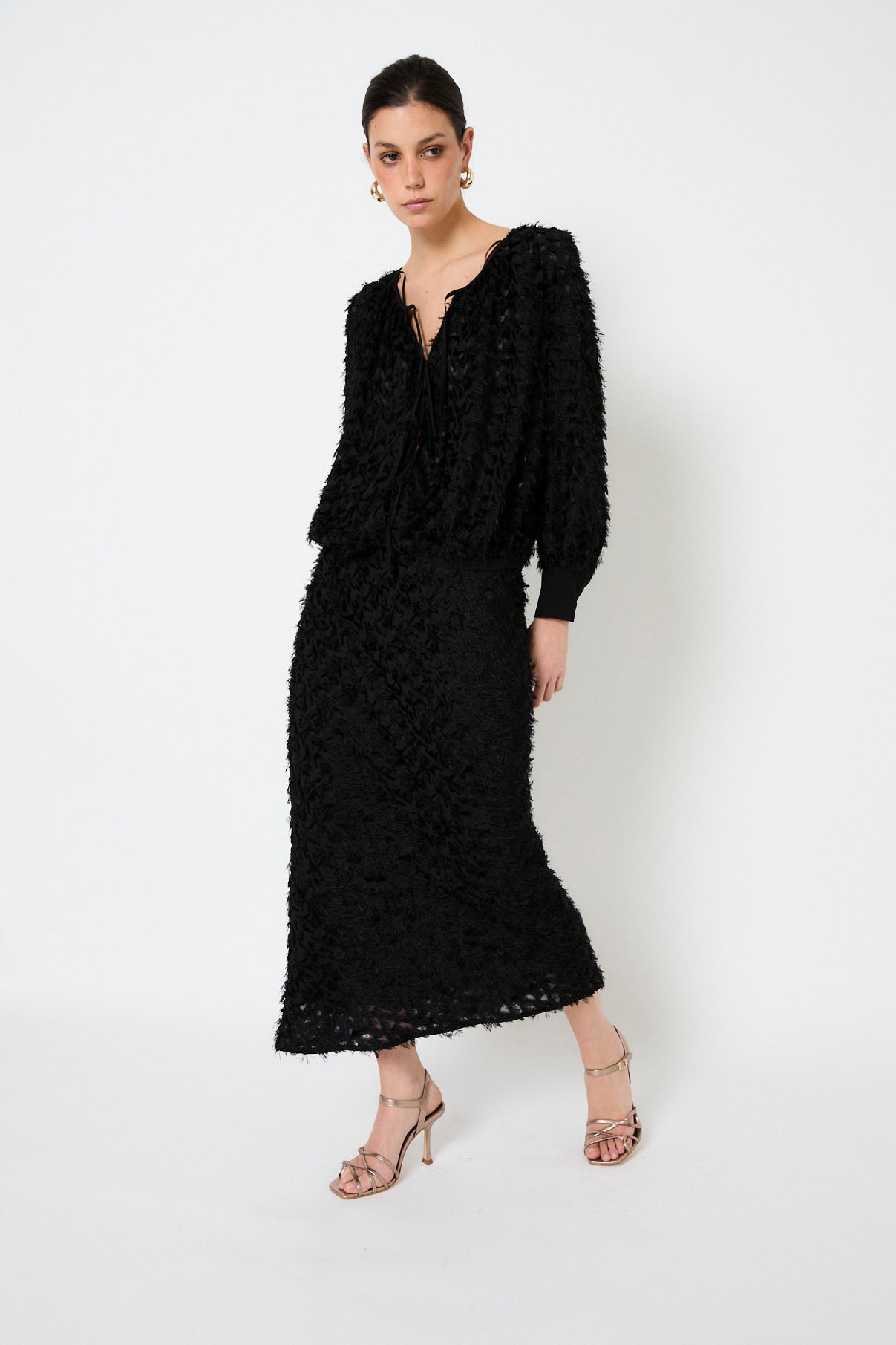 FALDA BIES PELUFO NEGRO